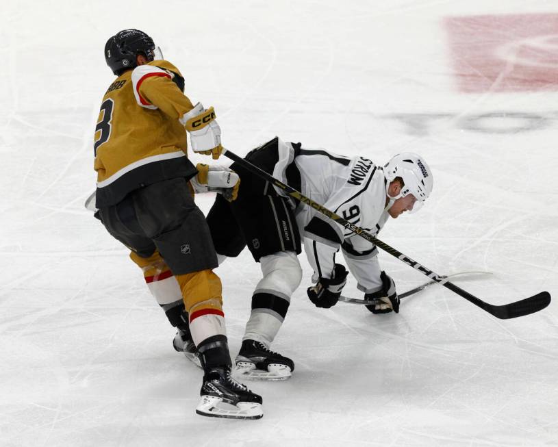 Golden Knights defenseman Brayden McNabb (3) drops Los Angeles Kings right wing Carl Grundstrom ...