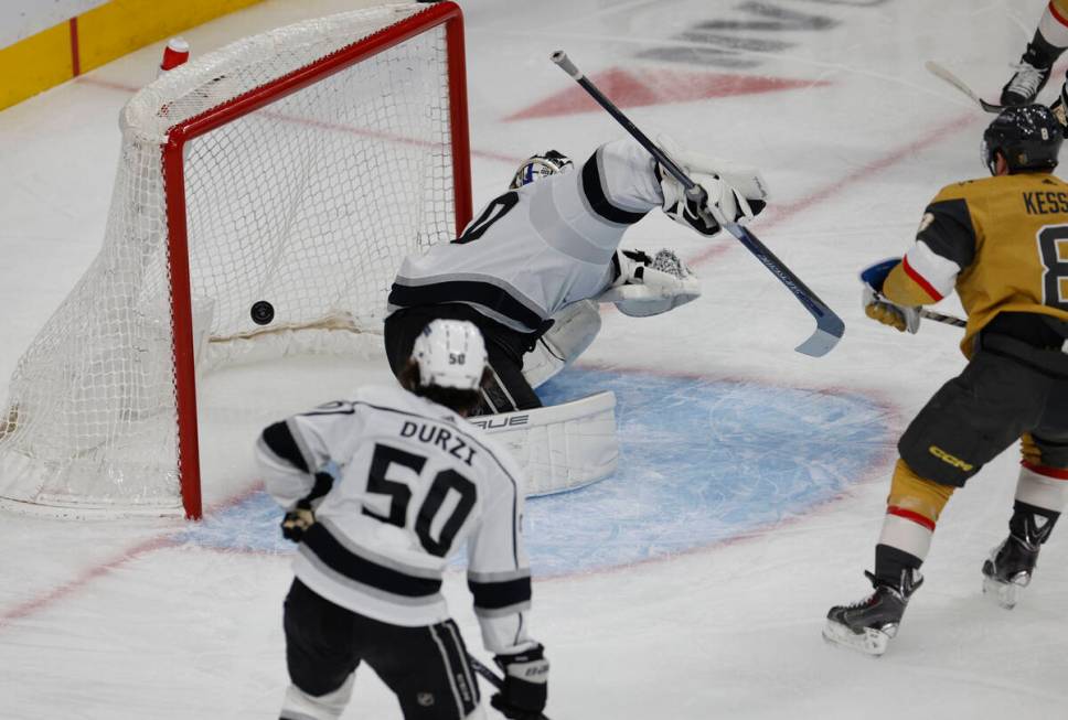 Los Angeles Kings goaltender Joonas Korpisalo (70) cannot stop a shot by Golden Knights center ...