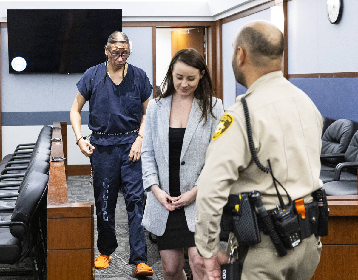 Former actor Nathan Chasing Horse, left, leaves the courtroom with his attorney Kristy Holston, ...