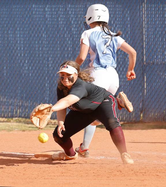 Centennial's Rebeca Venzor-Nuno (7) safely runs to the first as Desert Oasis' Aaliyah Stewart ( ...