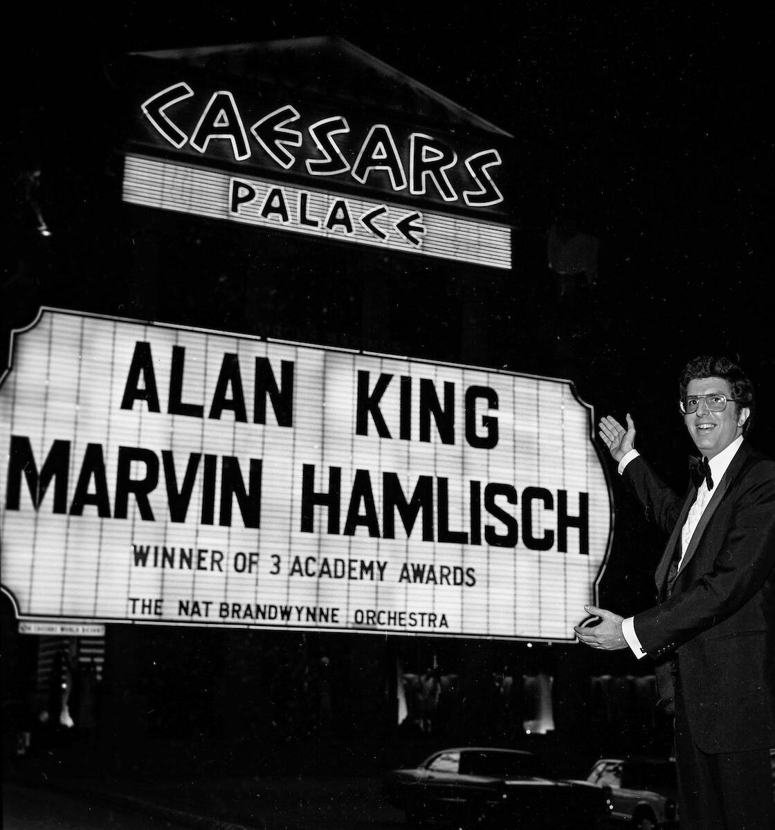 Marvin Hamlisch in front of the Caesars Palace marquee touting him and Alan King on Nov. 7, 197 ...