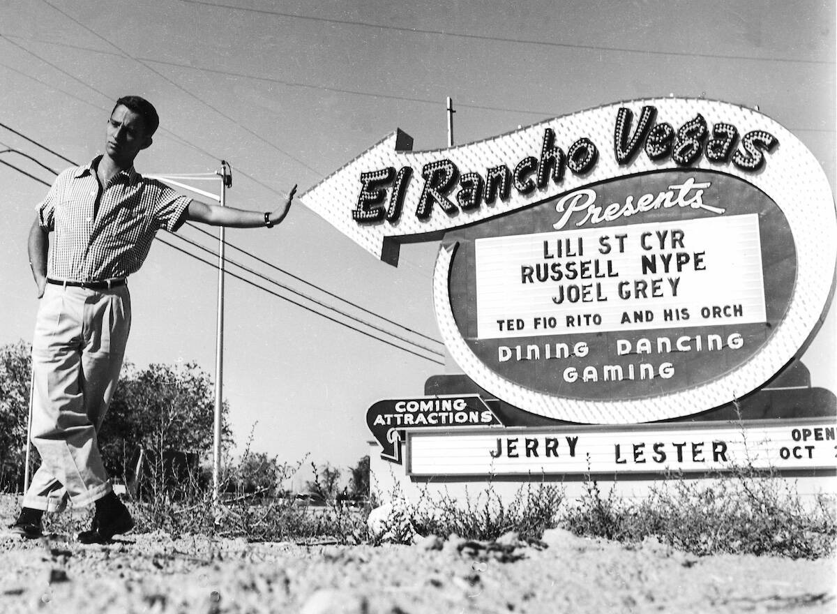 Joel Grey hangs around the El Rancho Vegas sign on May 15, 1955. (Las Vegas News Bureau)