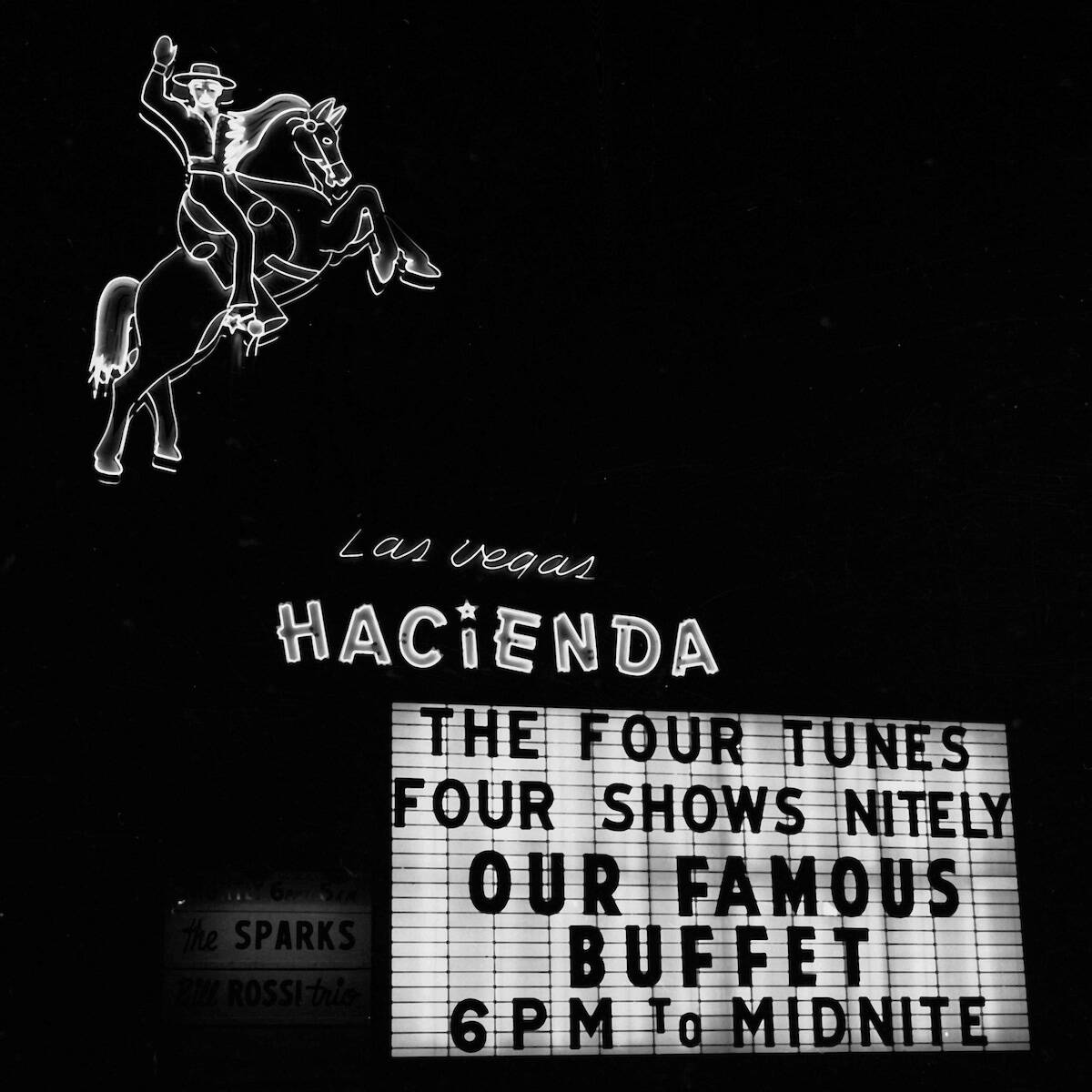 The Hacienda touts The Four Tunes and its Famous Buffet on Dec. 31, 1955. (Las Vegas News Bureau)