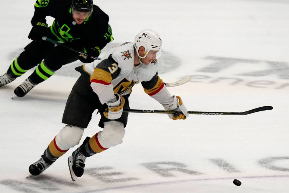 Vegas Golden Knights defenseman Brayden McNabb (3) skates for the puck in front of Dallas Stars ...