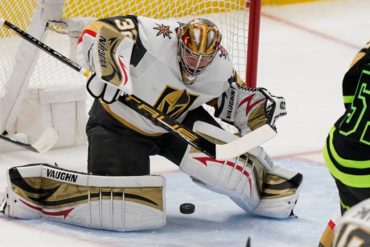 Vegas Golden Knights goaltender Jonathan Quick (32) defends the goal against the Dallas Stars d ...