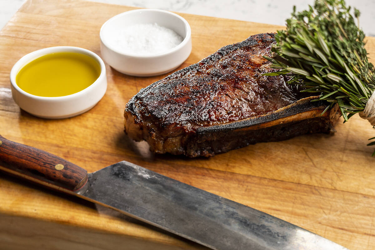 A dry-aged bone-in New York steak from Brezza in Resorts World on the Las Vegas Strip, named in ...