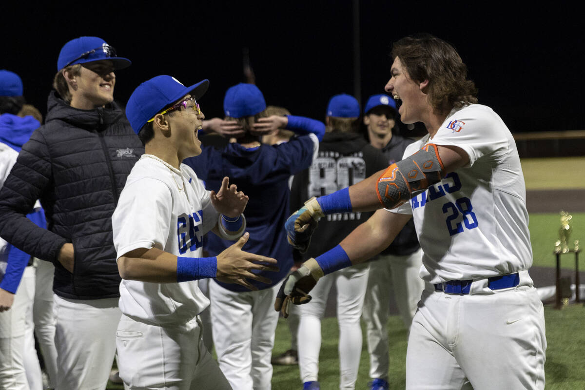 Bishop Gorman’s Landon Criste, left, and Easton Shelton celebrate after winning a high s ...