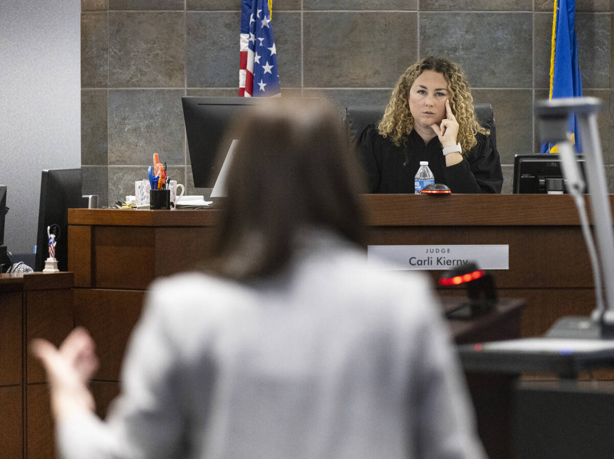 District Court Judge Carli Kierny listens as Kristy Holston, a public defender, representing fo ...