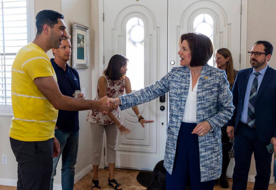 Sen. Catherine Cortez Masto, right, greets for the first time Mohammad "Benny" Shirza ...