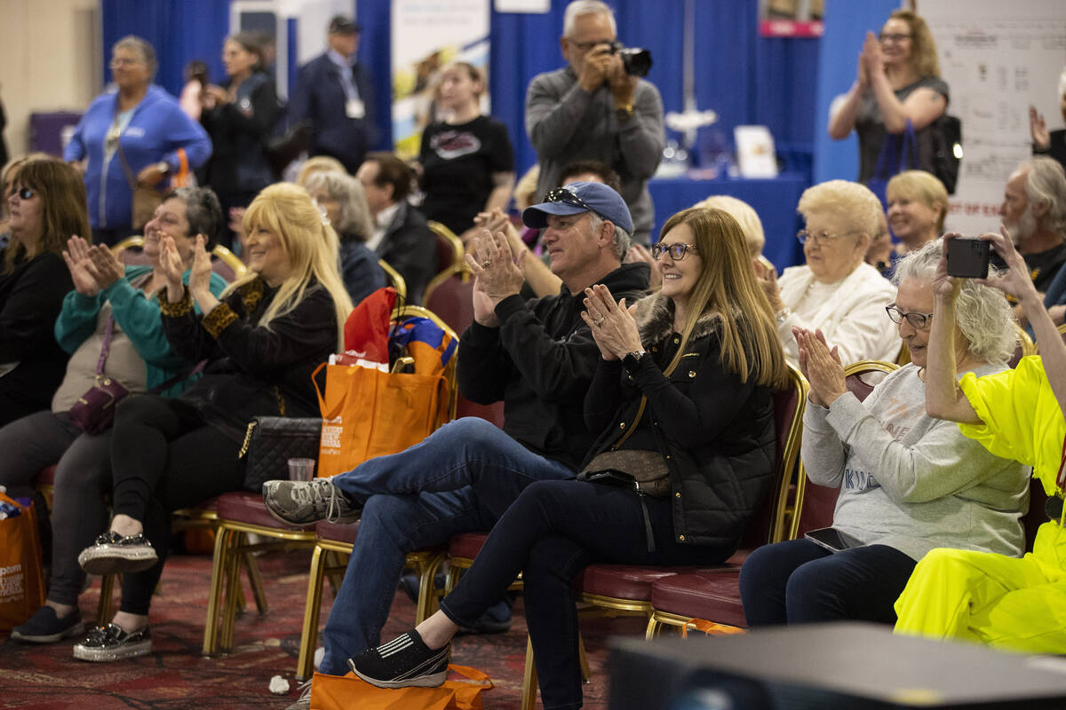 People watch the Vegas Golden Gals, a senior pompom squad, perform during the Aging Wellness Ex ...