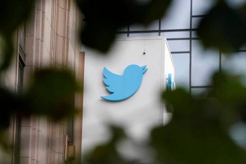 FILE - A sign at Twitter headquarters is shown in San Francisco, Dec. 8, 2022. Billionaire Elon ...
