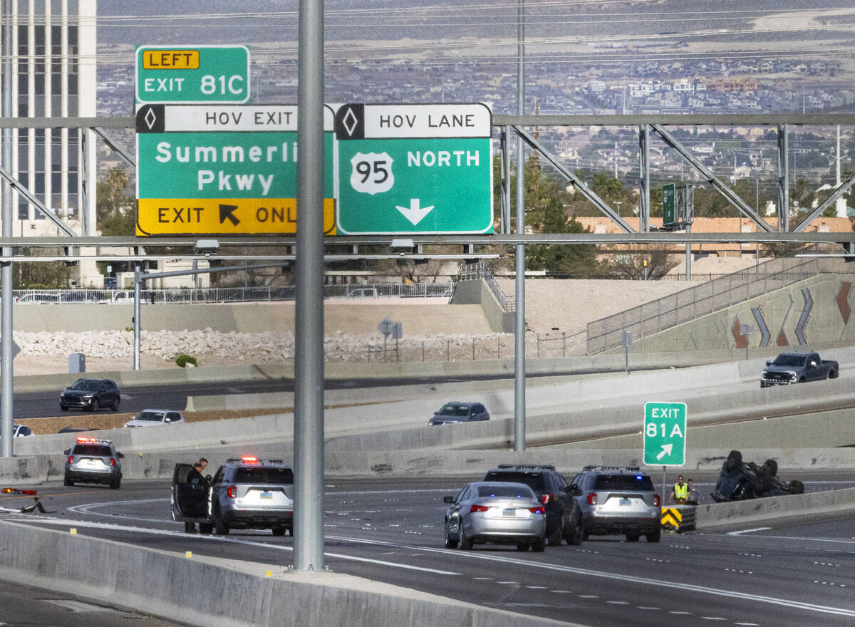 Traffic is diverted off northbound U.S. Highway 95 at Jones Boulevard as the NHP investigates a ...