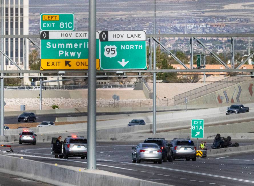 Traffic is diverted off northbound U.S. Highway 95 at Jones Boulevard as the NHP investigates a ...