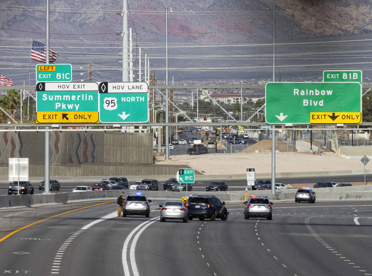 Traffic is diverted off northbound U.S. Highway 95 at Jones Boulevard as the NHP investigates a ...