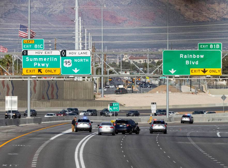 Traffic is diverted off northbound U.S. Highway 95 at Jones Boulevard as the NHP investigates a ...