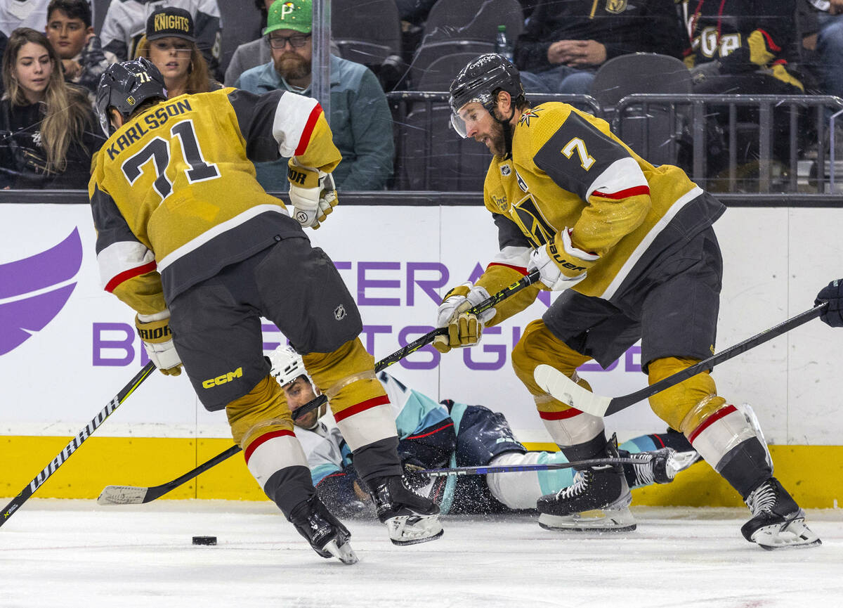 Golden Knights center William Karlsson (71) takes control of the puck after Seattle Kraken righ ...