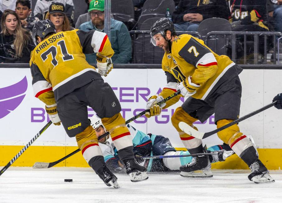 Golden Knights center William Karlsson (71) takes control of the puck after Seattle Kraken righ ...