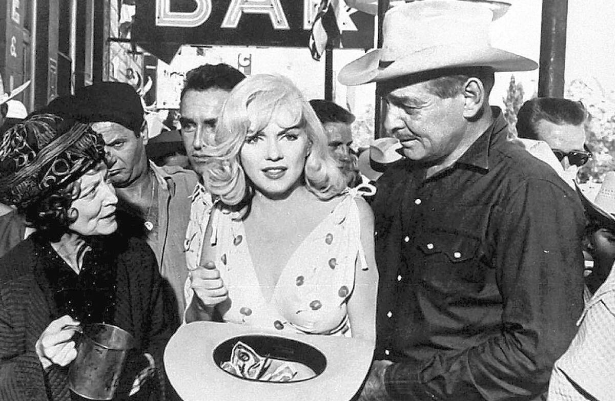 Marilyn Monroe with her winnings and Clark Gable in John Huston’s “The Misfits,” United A ...