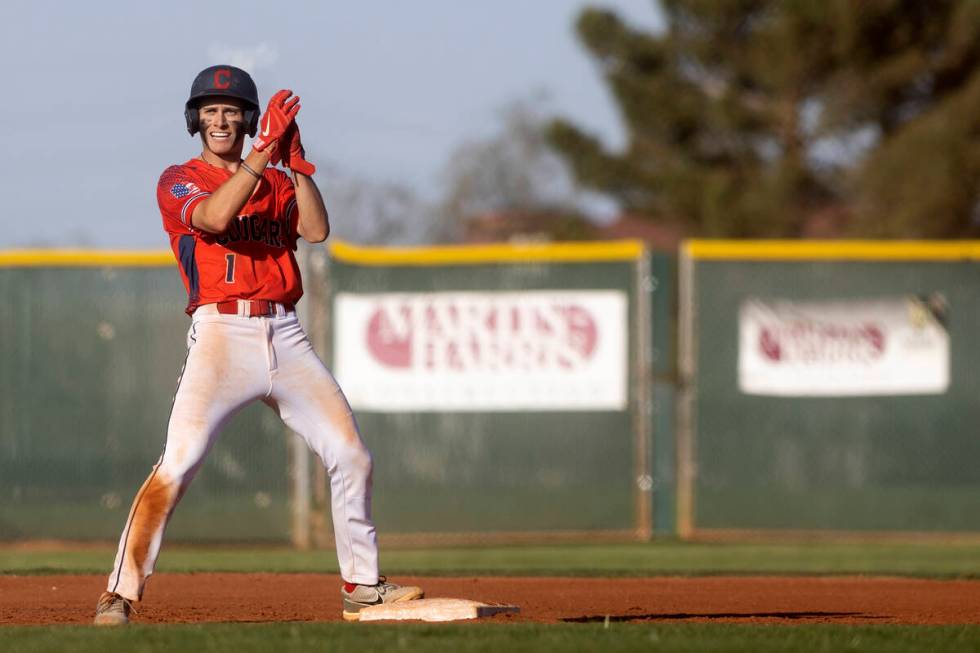 Coronado’s Evan Festa celebrates after hitting a double that scored an RBI during a high ...