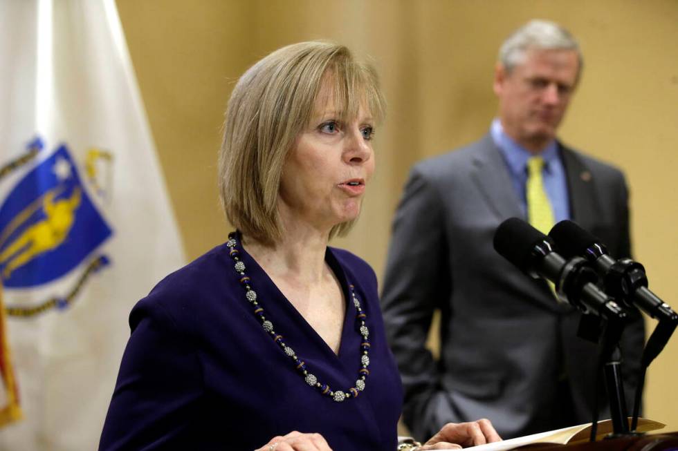 FILE - Newly appointed Chair of the Massachusetts Gaming Commission Cathy Judd-Stein, left, fac ...