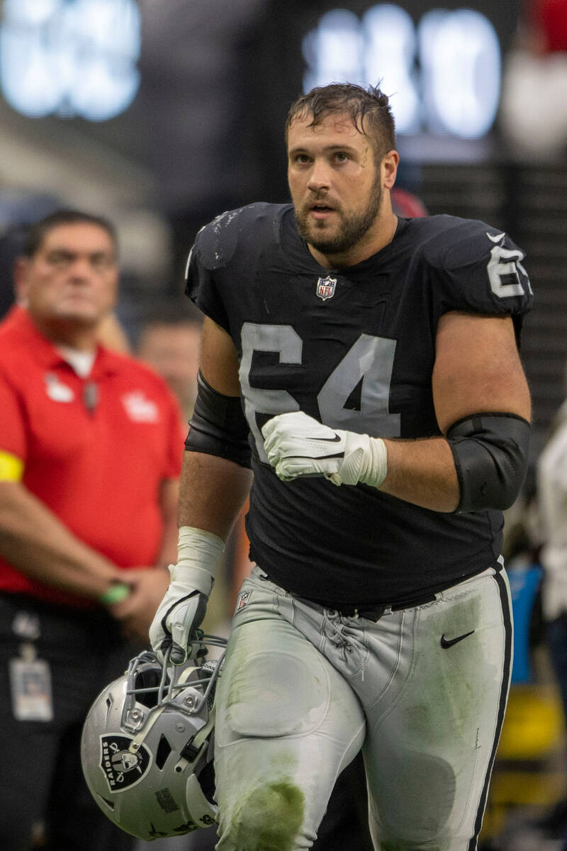 Raiders guard Alex Bars (64) heads to the locker room for halftime during of an NFL game agains ...