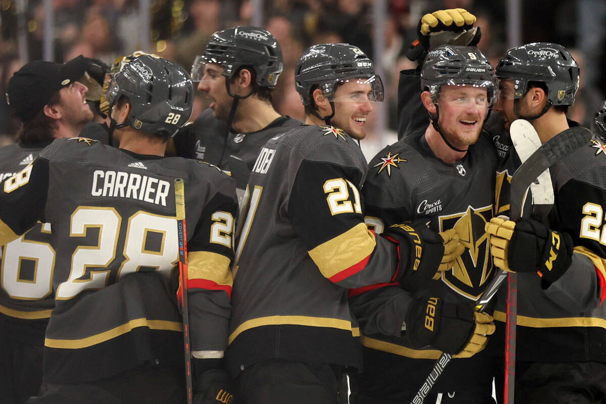 The Vegas Golden Knights celebrate after Vegas Golden Knights center Jack Eichel, second from r ...