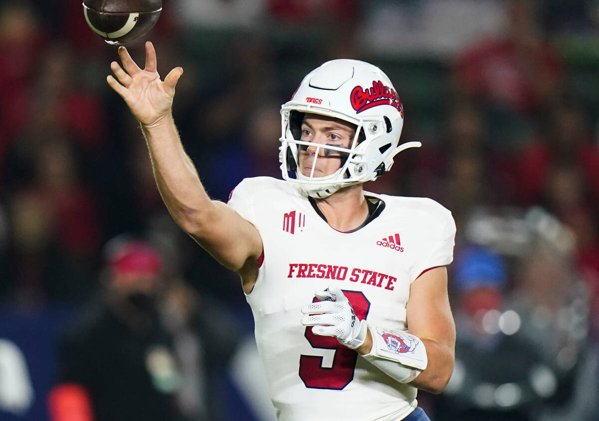 Fresno State quarterback Jake Haener throws a pass during the first half of an NCAA college foo ...
