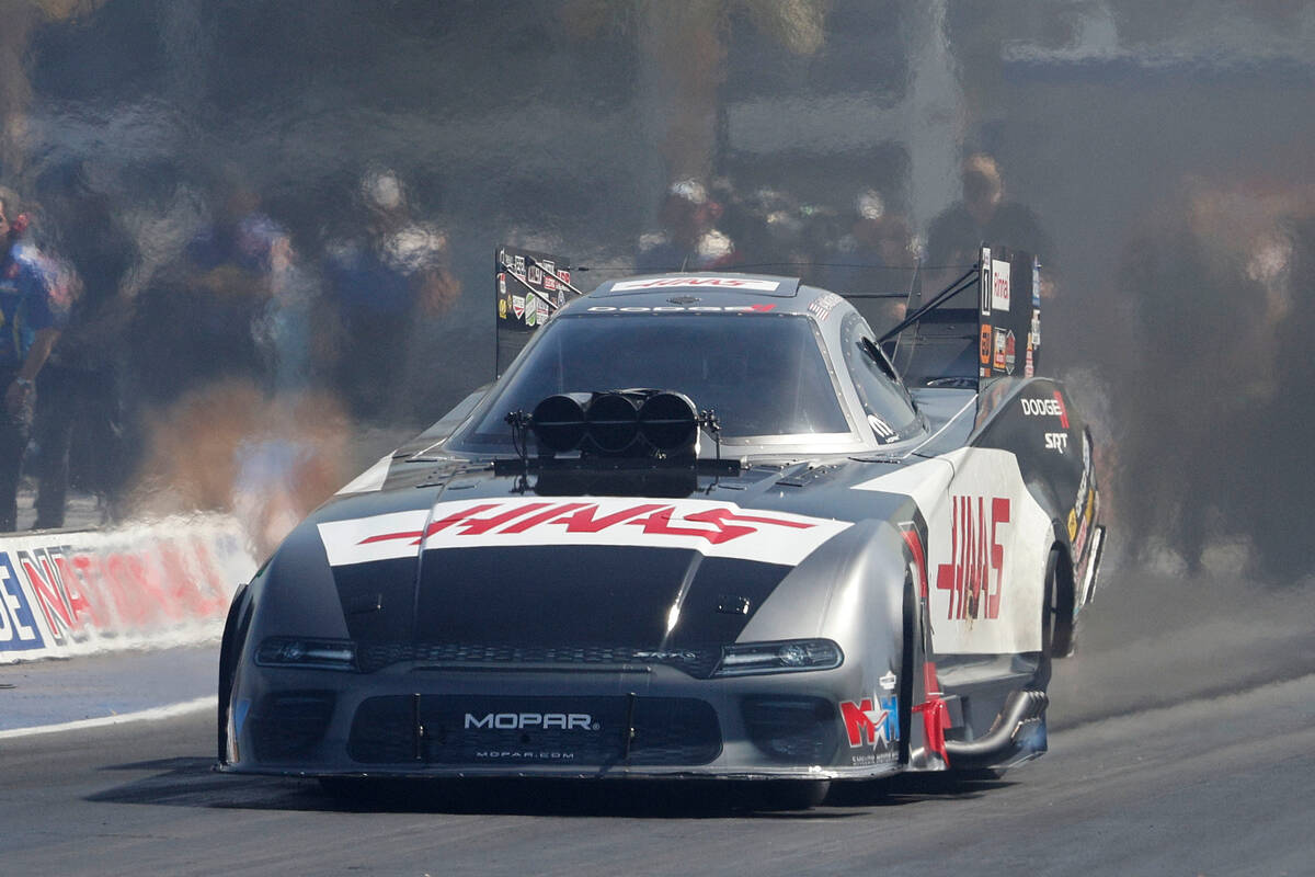NHRA driver Matt Hagan takes off from the line in his funny car in the second Nitro qualifying ...
