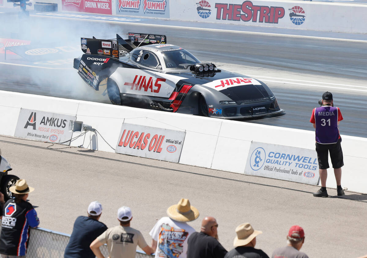 NHRA driver Matt Hagan tests his funny car before the first Nitro qualifying session during the ...