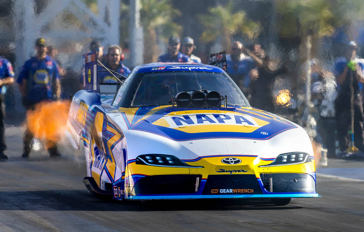 Funny Car driver Ron Capps leaves the start line on another qualifying race during Day 2 of NHR ...