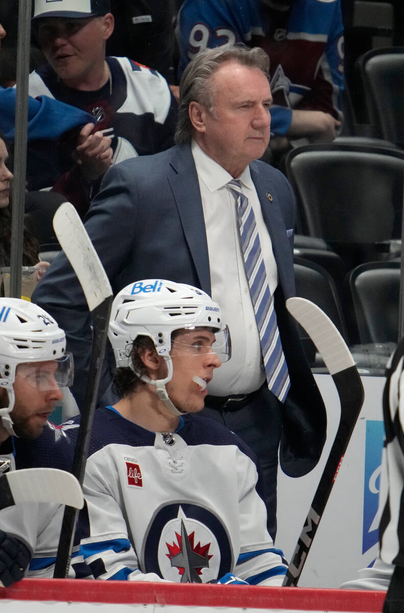 Winnipeg Jets head coach Rick Bowness in the second period of an NHL hockey game Thursday, Apri ...