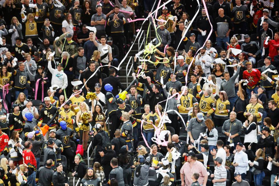 Golden Knights fans cheer during the second period of Game 1 of an NHL hockey Stanley Cup first ...