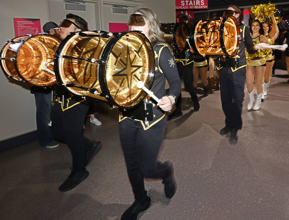 Vegas Golden Knights Knight Line by Drumbots and Vegas Vivas cheerleaders march around before G ...