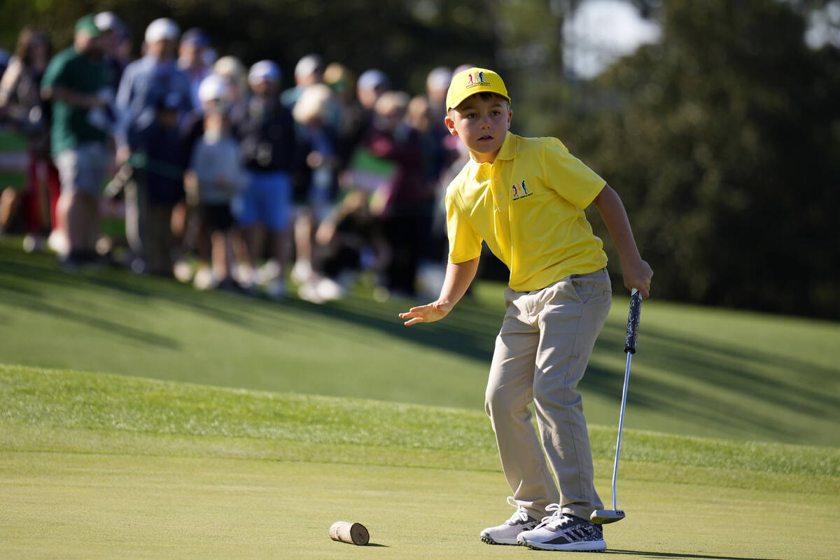 Koehn Kuenzler, 9, of Cortez, Colo., reacts after a putt at the Drive Chip & Putt National ...