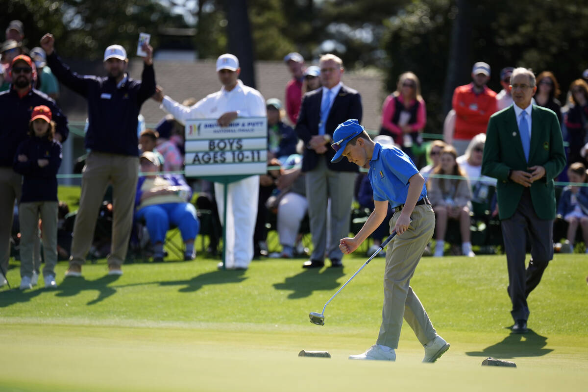 Brady Shaw, 11, of Pueblo, Colo., reacts after a putt at the Drive Chip & Putt National Fin ...