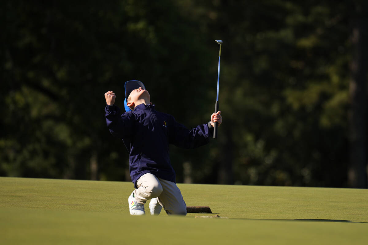 Jacob Eagan, 9, of Castle Rock, Colo., react after a putt at the Drive Chip & Putt National Fin ...