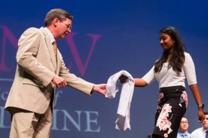 UNLV School of Medicine professor Jeffrey Fahl, left, looks to congratulate class of 2022 stude ...