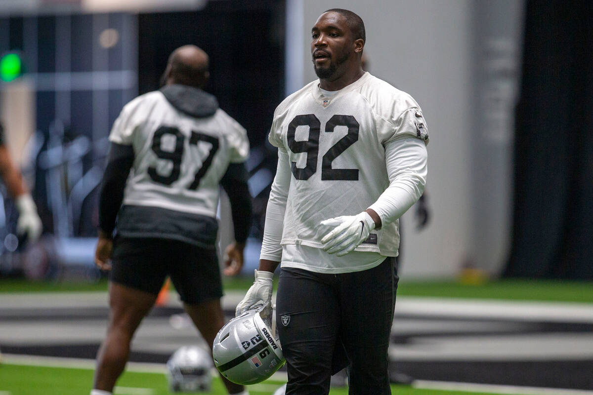 Las Vegas Raiders defensive end Chris Smith (92) warms up during a practice session at the team ...