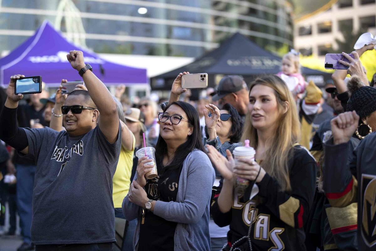 Golden Knights fans watch the pregame show before Game 2 of an NHL hockey Stanley Cup first-rou ...