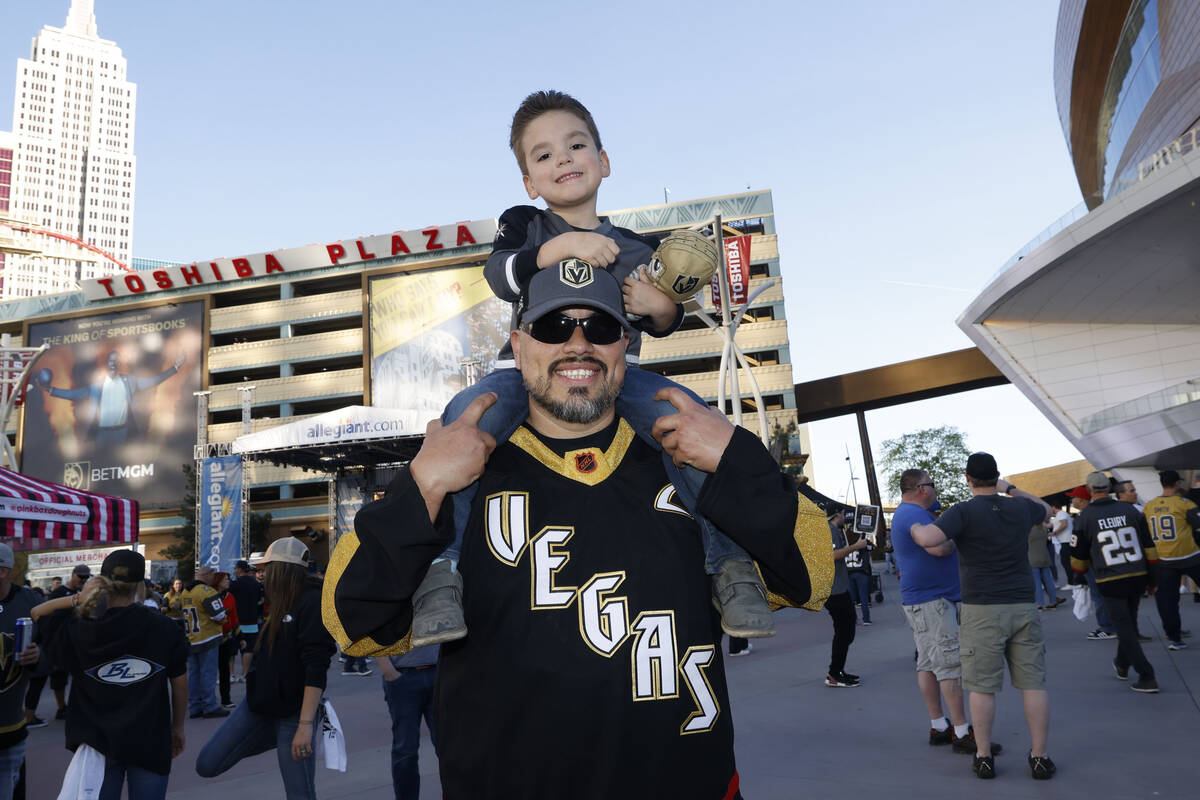 Ricardo Pesqueira Jr., of Las Vegas, poses for a photo with his son Ricardo Pesqueira III, 4, i ...