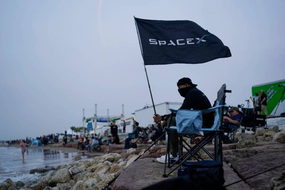 Jose Cabrera, a technician with SpaceX, waits as the SpaceX Starship, the world's biggest and m ...