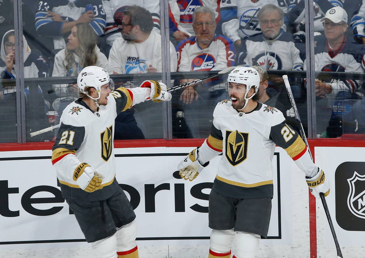 Vegas Golden Knights' Chandler Stephenson (20) celebrates his goal against the Winnipeg Jets wi ...