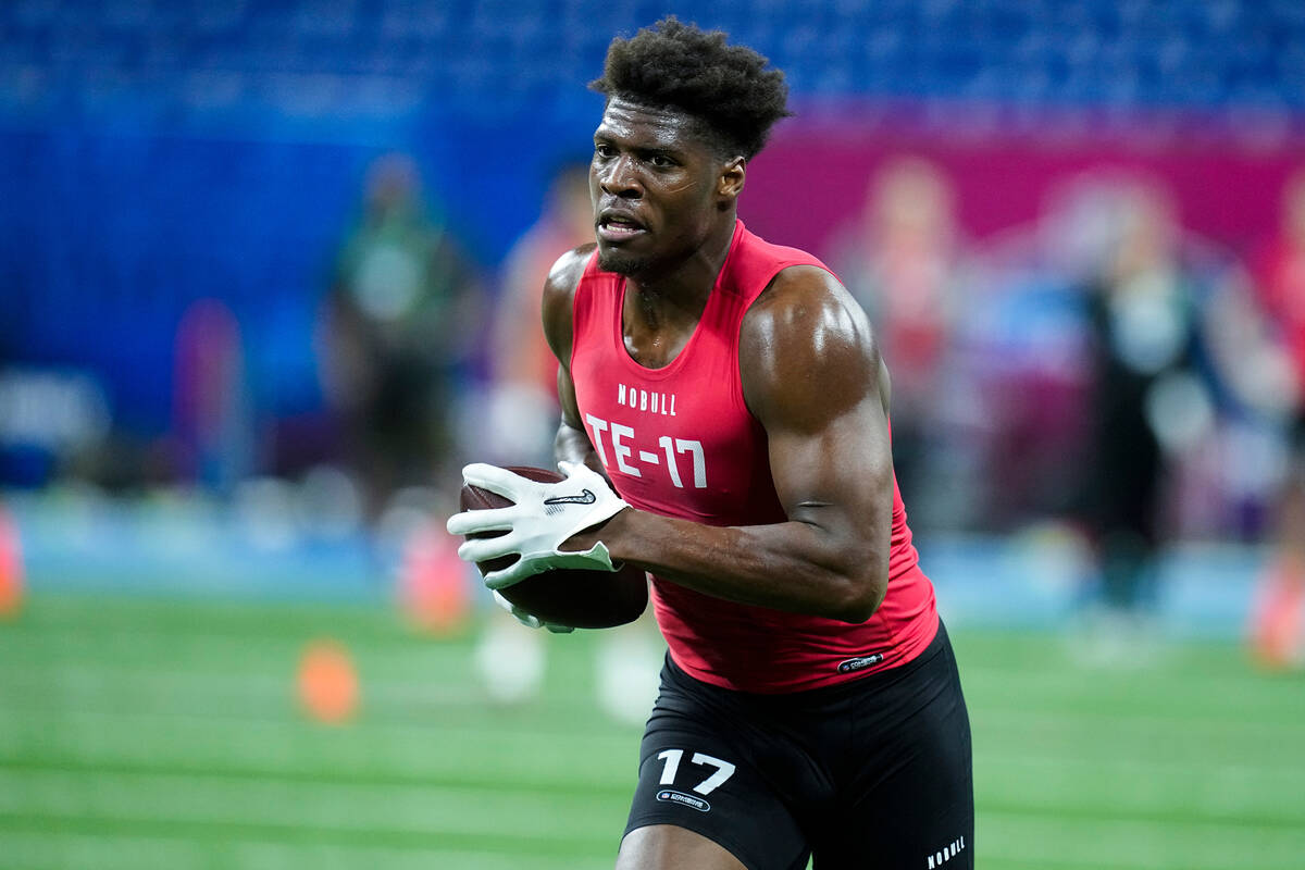FILE - Georgia tight end Darnell Washington runs a drill at the NFL football scouting combine i ...