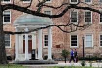 People on campus at the University of North Carolina in Chapel Hill, N.C., in March 2020. (AP P ...