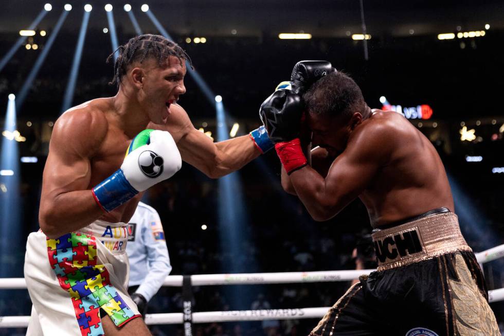 David Morrell Jr. fights with Yamaguchi Falcao during a super middleweight boxing bout at T-Mob ...