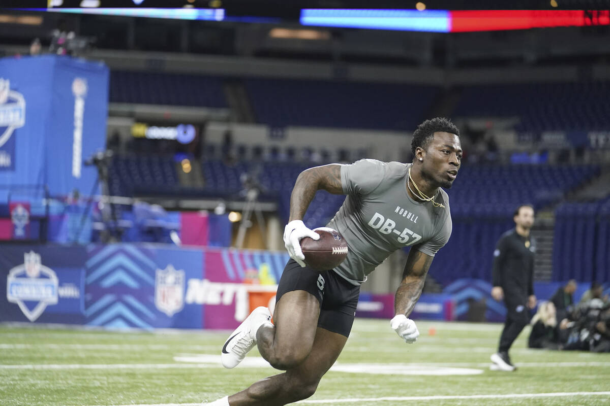 Florida State defensive back Jammie Robinson runs a drill at the NFL football scouting combine ...