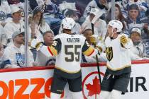 Vegas Golden Knights' Keegan Kolesar (55) and Jack Eichel (9) celebrate after Kolesar scored ag ...