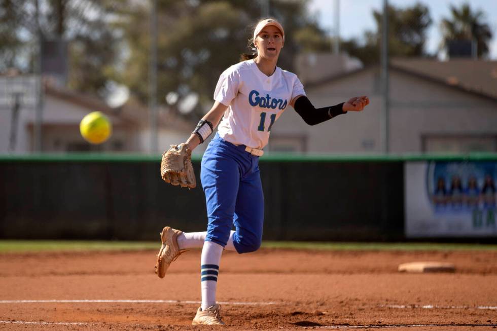 Green Valley’s Avari Morris pitches to Faith Lutheran during a high school softball game ...