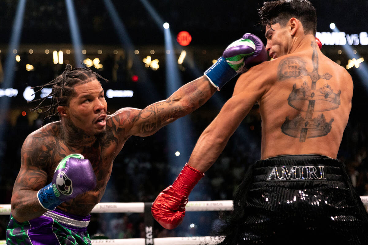 Gervonta Davis hits Ryan Garcia during a catchweight boxing bout at T-Mobile Arena on Saturday, ...