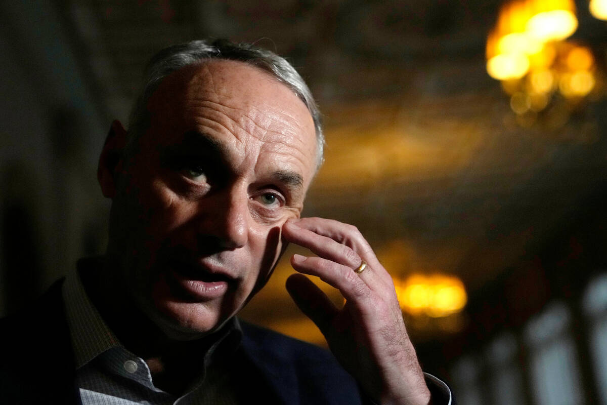 Major League Baseball Commissioner Rob Manfred speaks with the news media after a meeting of ML ...
